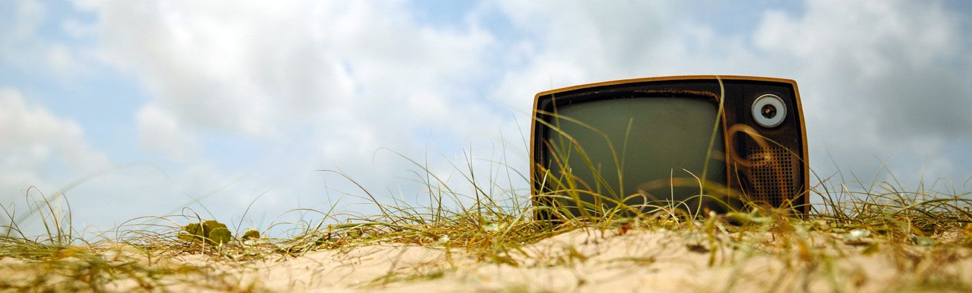 Old TV in the grass